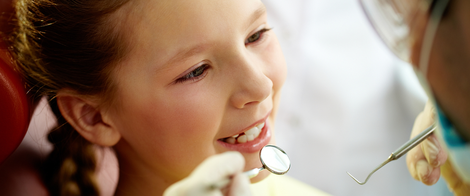 Child at dentist having teeth checked