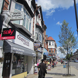 Front of surgery clearly located above neighbouring store.